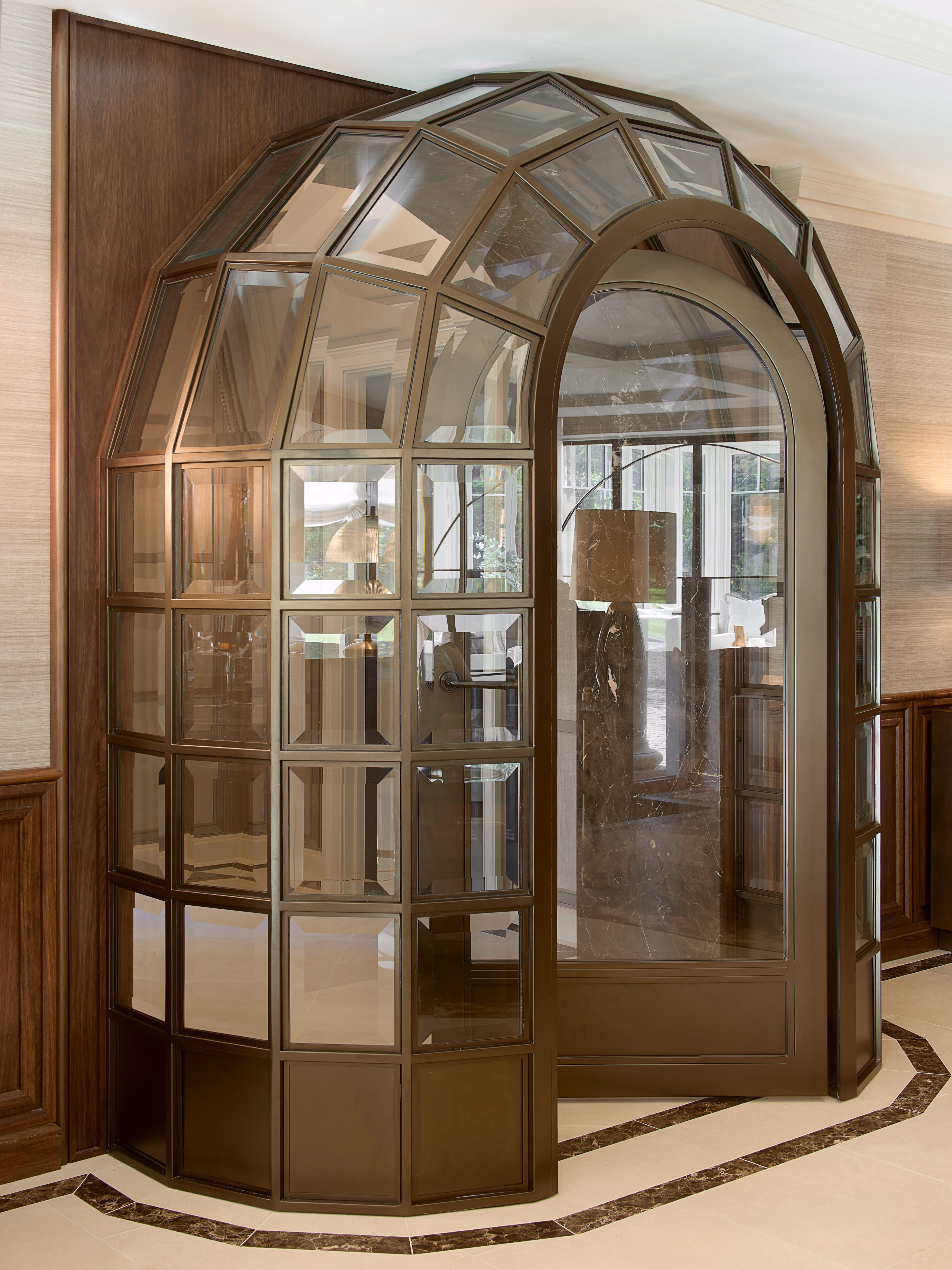 Bespoke glazed doors with bronze framing and finely crafted timber panelling